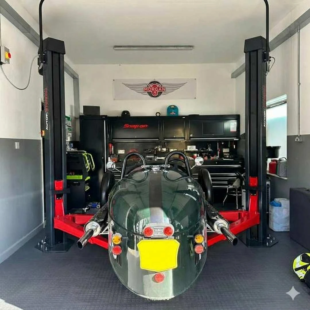 Morgan 3 Wheeler on the two-post lift inside the M3W Services UK workshop