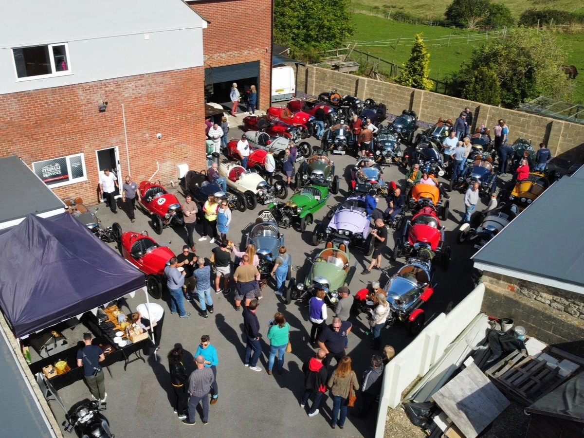 Morgan 3 Wheelers and owners gathered at an M3W Services UK open day in Purton